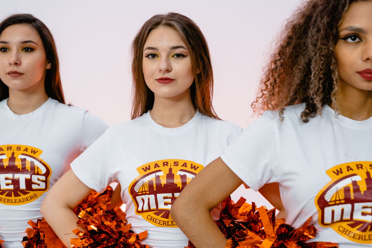 Cheer squad wearing full colour printed team tees